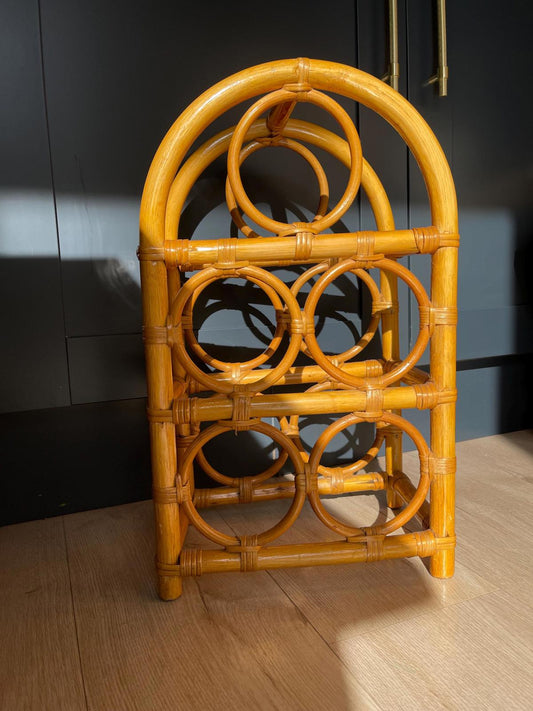 Vintage bamboo wine rack with space for 5 bottles, handcrafted freestanding bottle holder, mid-century modern bar accessory, boho home decor, natural woven bamboo storage for kitchen, dining room or home bar.