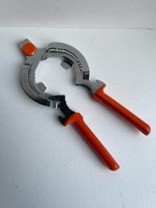 Vintage 1970s Leifheit Solingen orange jar opener, Space Age kitchen gadget made in Germany, retro kitchen accessory, Mid Century Modern cookware tool, collectible vintage kitchenware and practical home essential.