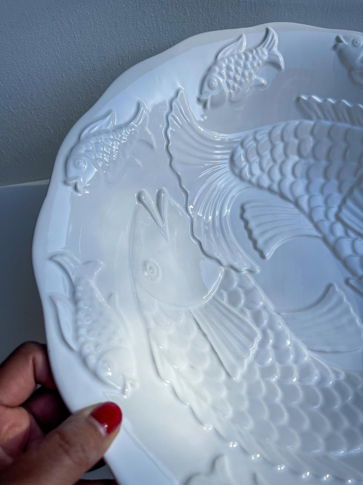Large white ceramic bowl with embossed Koi fish neutral home decor