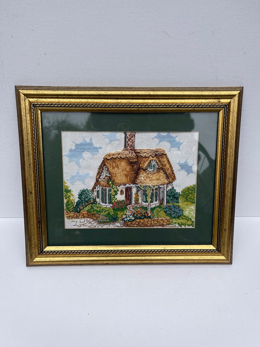 Vintage cottagecore cross stitch wall art in ornate gold frame, hand embroidered floral needlework, traditional textile artwork, rustic farmhouse home decor, vintage gallery wall accent and charming handmade craft display.