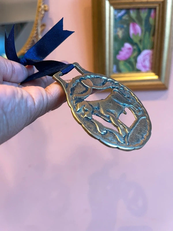 Rare antique Bull in Meadow horse brass harness medallion with leather ribbon, traditional English brass equestrian tack, collectible horse harness decoration, rustic farmhouse wall decor and vintage country home styling.